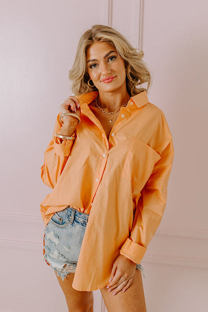 Sending Good Luck Button Up Top In Orange